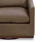 Fauteuil de salon pivotant en cuir étain - Silhouette incurvée, coussins ajustés