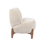 Fauteuil d'appoint arrondi en velours ivoire – Profil bas, base en bois massif