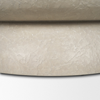 Table basse ronde en béton - Silhouette tambour, finition pierre pâle, intérieur